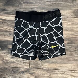 Nike Black and Gray Patterned Shorts with Yellow Logo